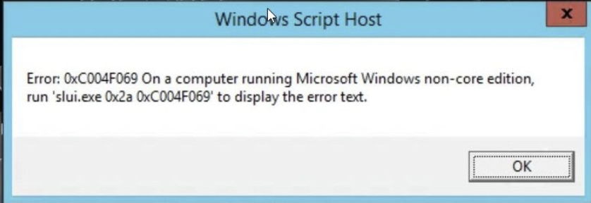 Windows Script Host dialog showing activation error 0xC004F069